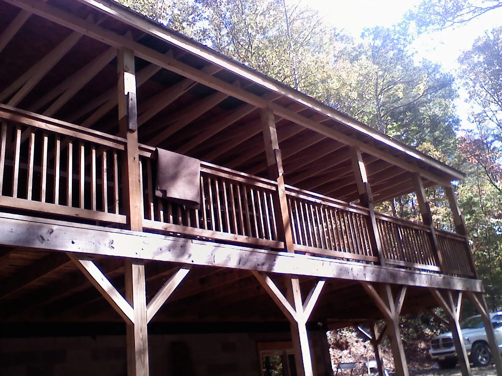Timber framing under a new elevated porch and deck — Roof Leak Repair in Lemont by Roofing Brothers